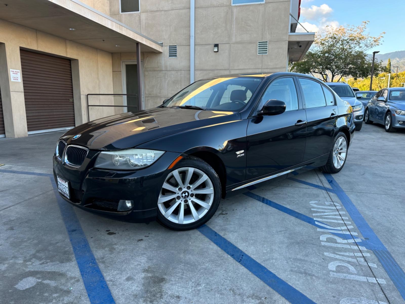 2011 /Tan BMW 3-Series 328i xDrive (WBAPK7C58BF) with an 3.0L L6 DOHC 24V engine, Automatic transmission, located at 30 S. Berkeley Avenue, Pasadena, CA, 91107, (626) 248-7567, 34.145447, -118.109398 - X Drive! South African Edition! Moon-roof! Leather! 2011 BMW 3-Series 328i xDrive - Luxury Meets Practicality in Pasadena, CA Dive into a realm where luxury and performance synchronize seamlessly. The 2011 BMW 3-Series 328i xDrive is not just a car; it's an experience. This model boasts BMW's - Photo #0